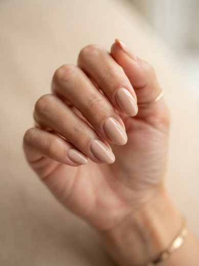 Glossy nude manicure