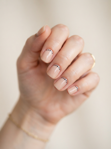 Nude black dot nails